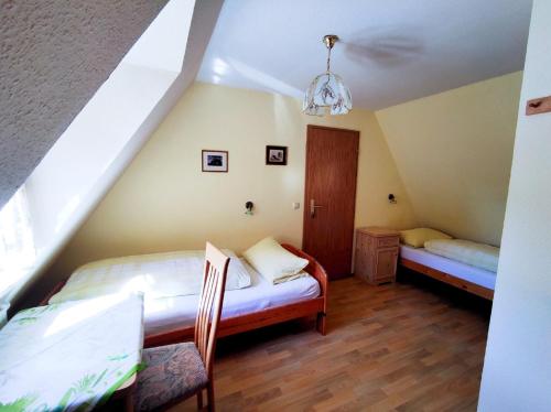 HERRNMÜHLE - Pension & Ferienwohnungen客房内的一张或多张床位