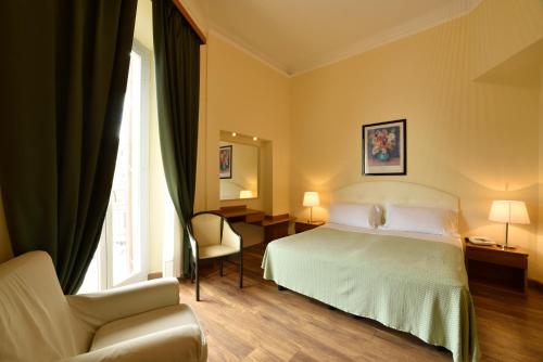 康可尔蒂亚欧洲酒店客房内的一张或多张床位