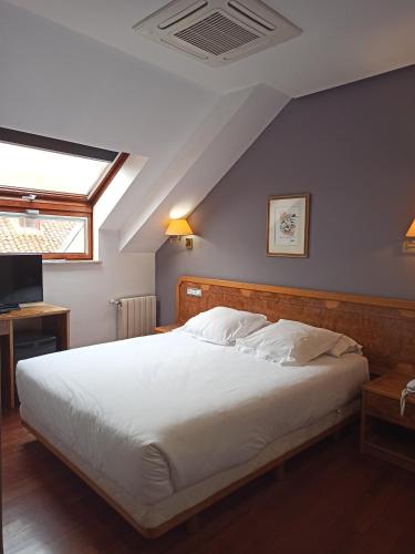 ARVA Spa París客房内的一张或多张床位