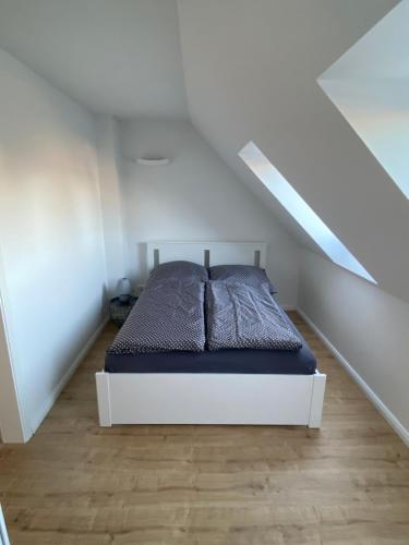 Haus Wesloer Landstraße 6b für 4 Personen客房内的一张或多张床位