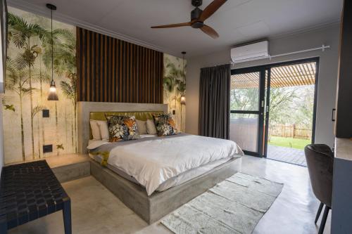 Muunga Bush Lodge & Spa客房内的一张或多张床位