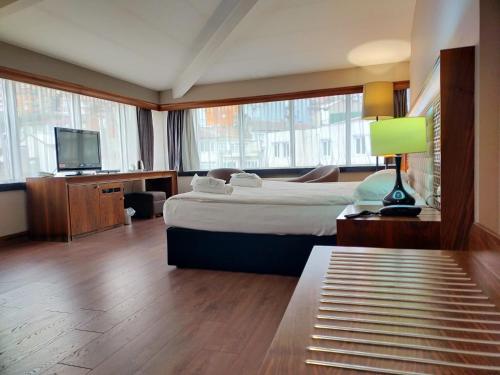 蒂拉温泉&SPA酒店客房内的一张或多张床位