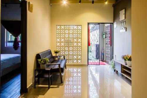 Spacious Newly Plumeria - 3BedRooms in share house的休息区