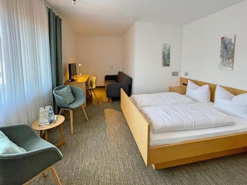 林德霍夫胡梅尔斯伯格酒店客房内的一张或多张床位