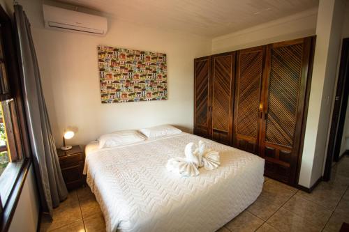 Cabanas Praia Mole Florianopolis客房内的一张或多张床位