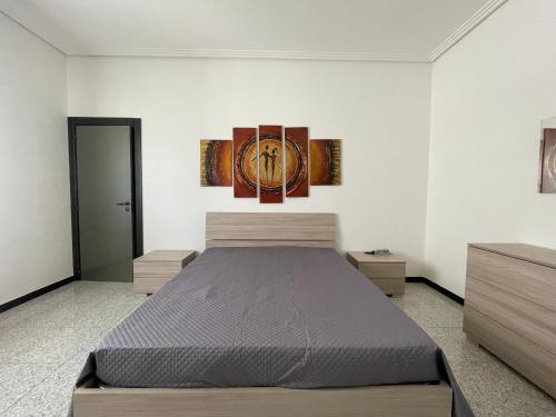 Vincenti's House Comiso客房内的一张或多张床位