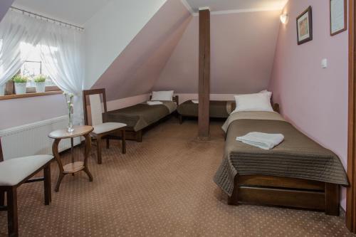 Zajazd Drogorad Restauracja i Noclegi客房内的一张或多张床位