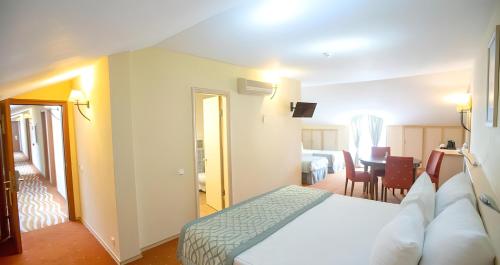 Göcek Lykia Resort Premium Concept Hotel客房内的一张或多张床位