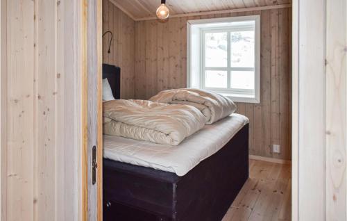 4 Bedroom Amazing Home In Ustaoset客房内的一张或多张床位