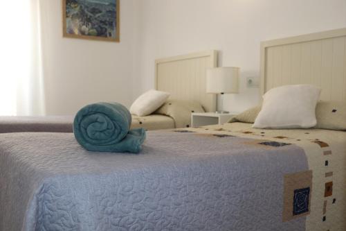 APARTAMENTO MORAIRA - 3 Habitaciones客房内的一张或多张床位