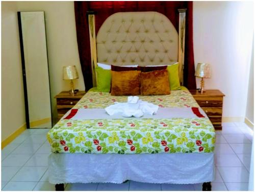 Caribbean estate deluxe 2客房内的一张或多张床位