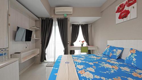 Apartemen Grand Dhika City by Nina客房内的一张或多张床位