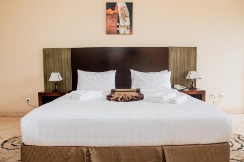 瑞索托酒店客房内的一张或多张床位