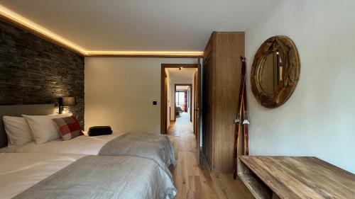 Zenith Views by Villars Luxury客房内的一张或多张床位