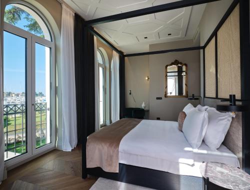 Palazzo Rainis Hotel & Spa - Small Luxury Hotel - Adults Only客房内的一张或多张床位