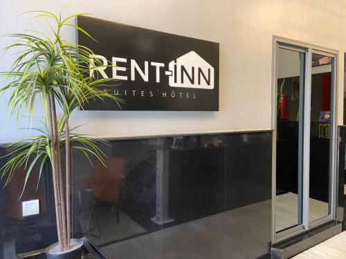 拉巴特RENT-INN Suites Hotel的进入酒店的标志