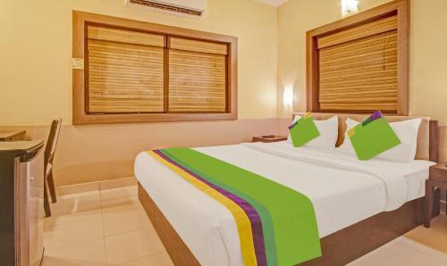 IKIGAI Green Valley Beach Resort客房内的一张或多张床位
