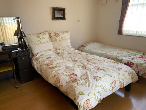 Tokai - House - Vacation STAY 11692客房内的一张或多张床位