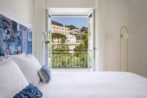 La Residenza Capri客房内的一张或多张床位
