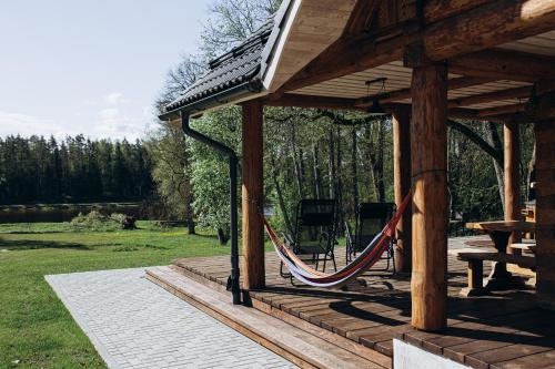 Laukbeitini"Gaujmale" sauna house in nature的相册照片