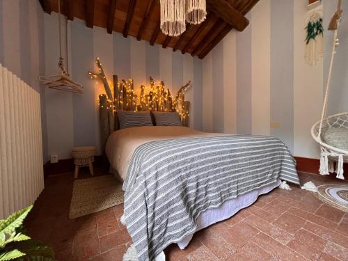 Borgo Al Canto Degli Alberi客房内的一张或多张床位