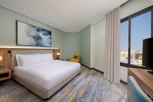 Staybridge Suites - Al Khobar City, an IHG Hotel客房内的一张或多张床位