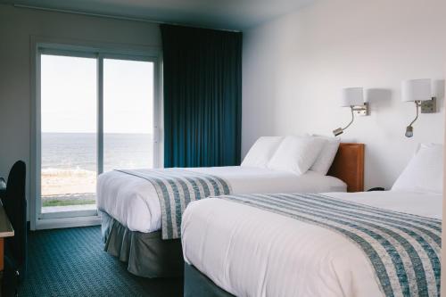 马塔讷海上凉亭里奥托酒店的海景客房 - 带两张床