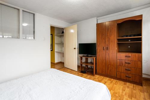 Apartamento Niza 127 dos personas客房内的一张或多张床位