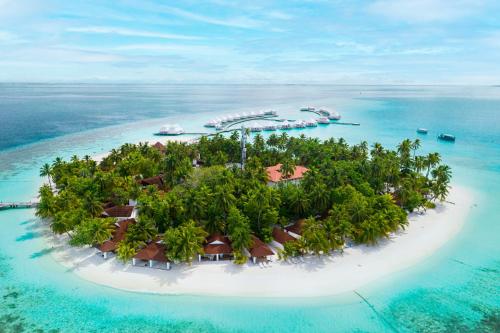 阿沙格岛Diamonds Athuruga Maldives Resort & Spa的海洋上的岛屿,上面有一个度假胜地