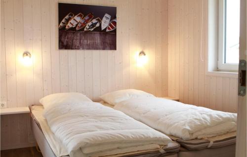 Friedrichskoog-deichblick 11客房内的一张或多张床位