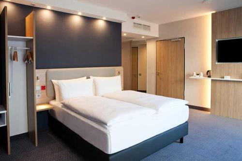 Holiday Inn Express Fürth, an IHG Hotel客房内的一张或多张床位