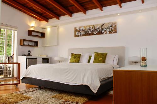 Una casa con vistas en Caracas客房内的一张或多张床位