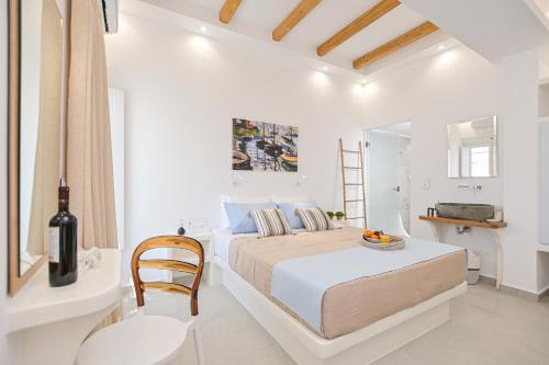Elite Suites Naxos客房内的一张或多张床位