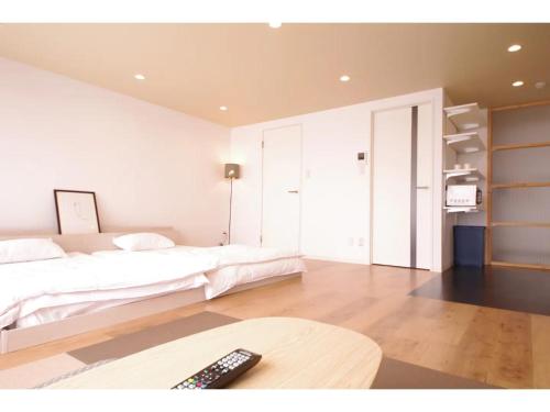 HOTEL APT SESELA - Vacation STAY 12881客房内的一张或多张床位