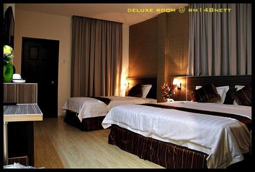 K Garden Hotel (BS)客房内的一张或多张床位