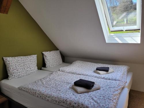 Ferienwohnung Forsthaus客房内的一张或多张床位