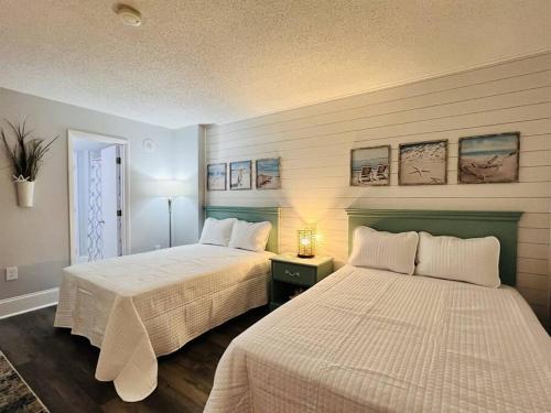 *FRESH MYRTLE BEACH RENO*Relax*Pools*Beach*More*T401客房内的一张或多张床位