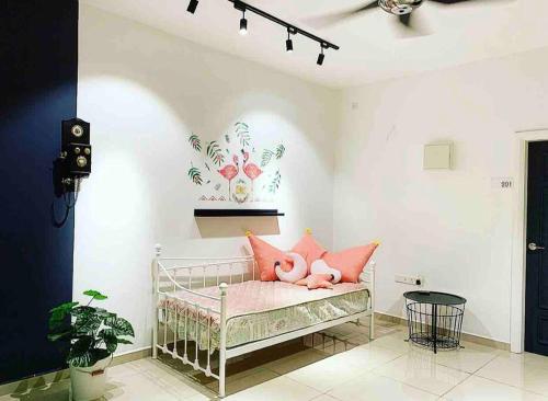 Fifteen Famiglia Malacca - Homestay客房内的一张或多张床位