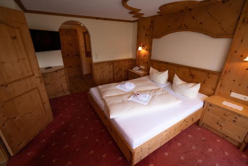 施温德博格霍夫全景酒店客房内的一张或多张床位