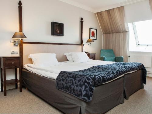 诺尔雪平伊力特格兰德酒店客房内的一张或多张床位