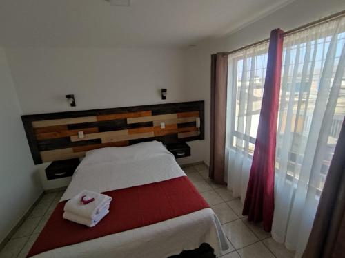 Hotel Andalucía客房内的一张或多张床位