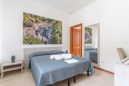 Hotel dei Tacchi客房内的一张或多张床位