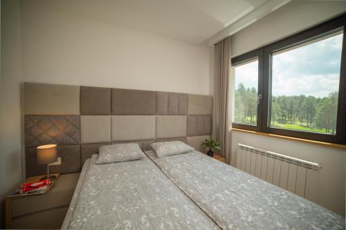 Vila Maša Zlatibor客房内的一张或多张床位