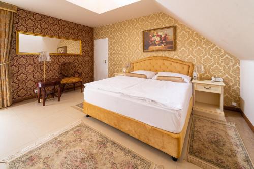 维塔Spa酒店客房内的一张或多张床位