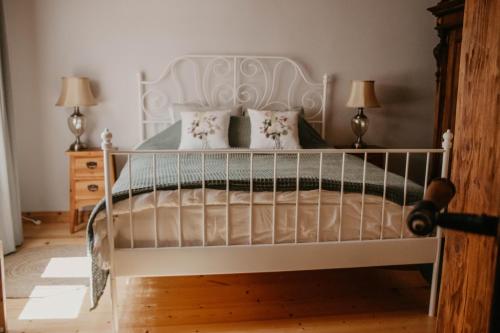 Zelta Apelsīna apartamenti客房内的一张或多张床位