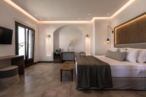 Vineyard Exclusive Suites客房内的一张或多张床位