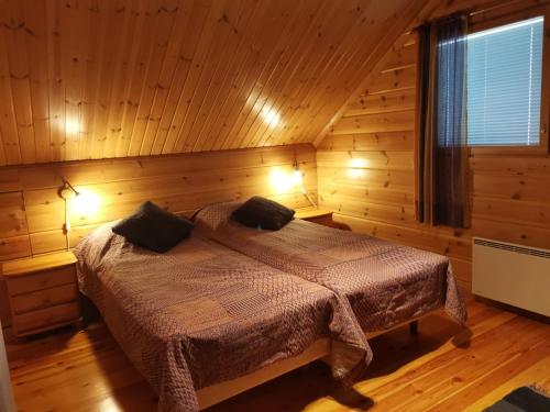 Sininen Hetki Cottage客房内的一张或多张床位