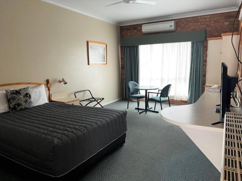 Tumbarumba Motel & Elms Restaurant客房内的一张或多张床位