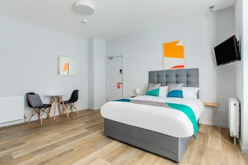 OYO Studiotel GY - Modern Hotel Apartments客房内的一张或多张床位