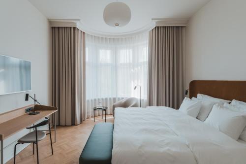 赫尔辛基托尔尼索罗索酷酒店客房内的一张或多张床位